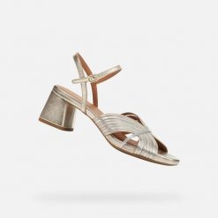 Sandały GEOX D GENZIANA MID Złoty. Szare sandały damskie Geox, bez wzorów, ze skóry, bez obcasa, bez zapięcia. Za 470.99 zł.