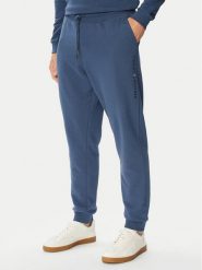 Tommy Hilfiger Spodnie dresowe UM0UM03664 Niebieski Regular Fit. Niebieskie spodnie sportowe męskie Tommy Hilfiger, m, bez wzorów, z bawełny. Za 289.99 zł.