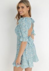 Niebieska Sukienka Clatiax. Niebieskie sukienki damskie Born2be, l, bez wzorów, z materiału, bez kołnierzyka, bez ramiączek, midi, rozkloszowane. Za 29.99 zł.