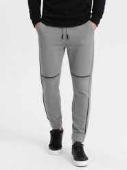 Spodnie męskie dresowe z kontrastowymi przeszyciami - szare V2. Szare spodnie sportowe męskie Ombre Clothing, l, bez wzorów, z bawełny. W wyprzedaży za 69.99 zł.