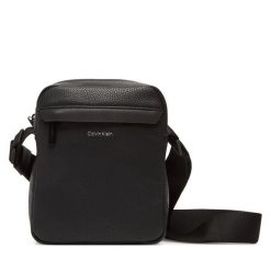 Saszetka Calvin Klein. Czarne saszetki i nerki męskie Calvin Klein, bez wzorów. Za 259.99 zł.