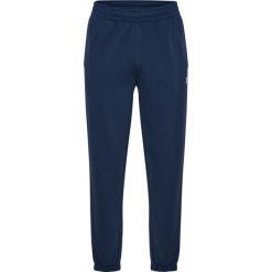 Spodnie do biegania Hummel Pulse. Niebieskie spodnie sportowe męskie Hummel, l, bez wzorów, z dresówki, do biegania. Za 217.00 zł.