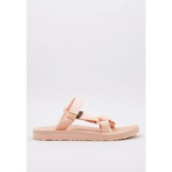 Klapki damskie Teva Universal Slide. Brązowe klapki damskie Teva, bez wzorów, sportowe, bez obcasa, bez zapięcia. Za 169.99 zł.