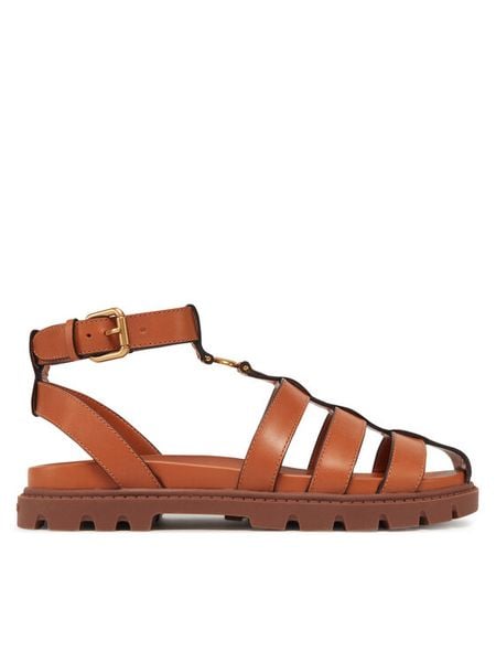 Coach Sandały CAR69 Brązowy. Brązowe sandały damskie Coach, bez wzorów, ze skóry, bez obcasa, na płaskiej podeszwie, bez zapięcia. Za 899.99 zł.