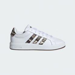 Adidas Junior KI5695 Biały - Tenisówki lifestyle. Białe trampki męskie Adidas, bez wzorów, z materiału, klasyczne, bez zapięcia. Za 160.99 zł.