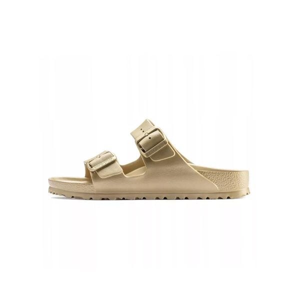 Klapki damskie Birkenstock Arizona Eva. Żółte klapki damskie Birkenstock, na lato, bez wzorów, z materiału, bez obcasa, bez zapięcia. Za 188.10 zł.