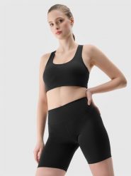 4F Legginsy kolarki treningowe z materiału z recyklingu damskie - czarne M. Czarne legginsy damskie 4F, l, bez wzorów, z dzianiny, na fitness i siłownię. W wyprzedaży za 49.99 zł.