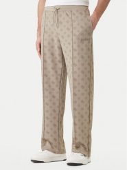Guess Spodnie dresowe Z6GB03 K2850 Beżowy Regular Fit. Brązowe spodnie sportowe męskie Guess, m, z aplikacjami, z dresówki. Za 519.99 zł.