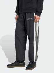 Adidas Spodnie dresowe Cutline Track KW8023 Czarny Regular Fit. Czarne komplety dresowe męskie Adidas, m, bez wzorów, z dresówki. Za 328.99 zł.