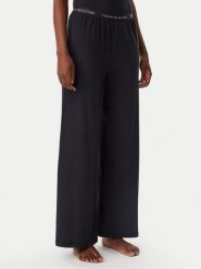 Tommy Hilfiger Spodnie piżamowe UW0UW05776 Czarny Relaxed Fit. Czarne piżamy damskie Tommy Hilfiger, bez wzorów, z bawełny, bez ramiączek. Za 219.99 zł.