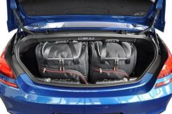 Torby Do Bagażnika Bmw 6 Cabrio 2011-2018 4Szt Kjust. Czarne torby podróżne damskie KJUST, bez wzorów, z kauczuku. Za 964.00 zł.