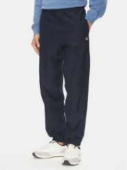 Calvin Klein Jeans Spodnie dresowe Premium LV04RC279G Granatowy Regular Fit. Niebieskie spodnie sportowe męskie Calvin Klein Jeans, l, bez wzorów, z bawełny. Za 329.99 zł.