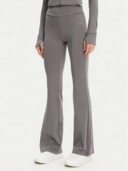 Guess Spodnie dresowe V5RB15 KCD02 Szary Regular Fit. Szare spodnie dresowe damskie Guess, z aplikacjami, z dresówki. Za 239.99 zł.