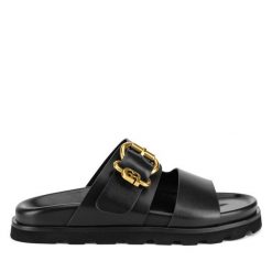 Klapki GINO ROSSI. Czarne klapki damskie Gino Rossi, bez wzorów, bez obcasa, bez zapięcia. Za 329.99 zł.