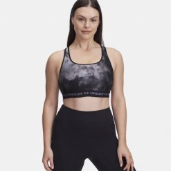 Damski Top Biustonosz Sportowy Under Armour Crossback Mid Print. Czarne obuwie sportowe damskie Under Armour, bez wzorów, bez zapięcia, na fitness i siłownię. Za 129.99 zł.