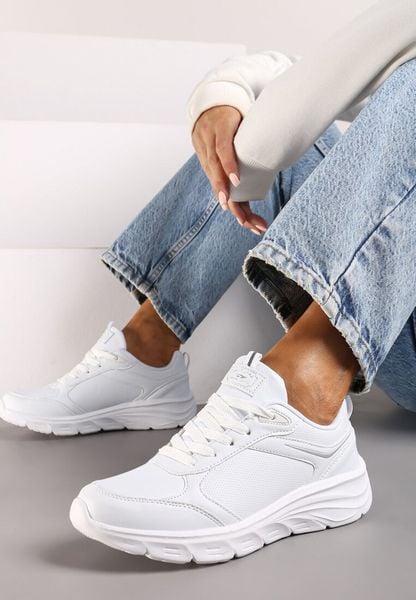 Białe Klasyczne Płaskie Buty Sportowe Sneakersy z Tłoczoną Podeszwą Velandria. Białe obuwie sportowe damskie Born2be, bez wzorów, z bawełny, bez zapięcia. Za 119.99 zł.