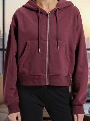 Bluza z kapturem z zapięciem - czerwony. Czerwone bluzy damskie Sinsay, l, bez wzorów, bez ramiączek, z kapturem. W wyprzedaży za 27.99 zł.