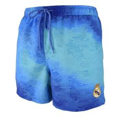 Królewskie niebieskie spodenki kąpielowe Real Madryt z herbem - XL. Niebieskie kąpielówki męskie REAL MADRID, l, bez wzorów. W wyprzedaży za 103.74 zł.