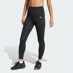 Legginsy Optime Stash 7/8. Czarne legginsy damskie Adidas, bez wzorów. Za 259.00 zł.