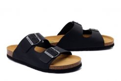 DR. BRINKMANN 600390-1 schwarz, klapki profilaktyczne damskie. Czarne klapki damskie Dr. Brinkmann, bez wzorów, ze skóry, bez obcasa, bez zapięcia. Za 264.90 zł.