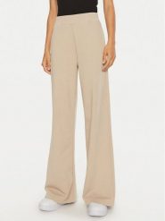 Calvin Klein Jeans Spodnie dresowe J20J222597 Beżowy Relaxed Fit. Brązowe spodnie dresowe damskie Calvin Klein Jeans, bez wzorów, z bawełny. Za 289.99 zł.