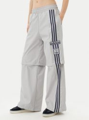 Adidas Spodnie dresowe Adibreak JJ3122 Szary Regular Fit. Szare spodnie dresowe damskie Adidas, bez wzorów, z dresówki. Za 239.99 zł.