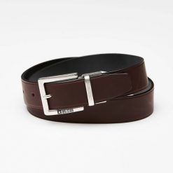 Pasek męski Big Star, naturalna skóra licowa w ciemnobrązowym kolorze z metalową klamrą o matowym wykończeniu oraz klasyczną szerokością do codzienne. Brązowe paski męskie Big Star Accessories, ze skóry, eleganckie. Za 118.99 zł.