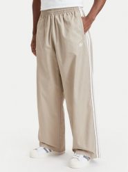 Adidas Spodnie dresowe Adicolor Sst Cotton Twill Trousers KR1385 Beżowy Relaxed Fit. Brązowe spodnie sportowe męskie Adidas, m, bez wzorów, z bawełny. Za 349.99 zł.