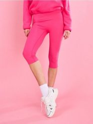 Legginsy sportowe Gym Hard - różowy. Czerwone legginsy damskie Sinsay, bez wzorów. Za 29.99 zł.