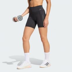 Krótkie legginsy Optime Workout 3-Stripes. Czarne legginsy sportowe damskie Adidas, bez wzorów, z lycry, z podwyższonym stanem, krótkie, na fitness i siłownię. Za 199.00 zł.