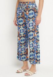 Niebieskie Spodnie Szerokie z Bawełny w Etno Print Tolivenna. Niebieskie spodnie materiałowe damskie Born2be, bez wzorów, z bawełny, eleganckie. Za 29.99 zł.