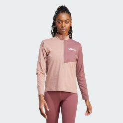 Koszulka Terrex Multi Climacool 1/2 Zip Long Sleeve. Czerwone bluzki damskie Adidas, xl, bez wzorów, sportowe, bez kołnierzyka, bez ramiączek. Za 259.00 zł.