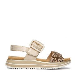 Sandały Remonte. Żółte sandały damskie Remonte, bez wzorów, bez obcasa, na płaskiej podeszwie, bez zapięcia. Za 379.99 zł.