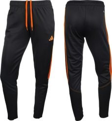Adidas Spodnie damskie adidas Tiro 23 Club Training czarno-pomarańczowe HZ0189 S. Brązowe spodnie dresowe damskie Adidas, bez wzorów, sportowe. Za 142.07 zł.