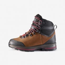 Buty trekkingowe damskie Forclaz MT100 szerokie skóra wodoodporne. Brązowe obuwie trekkingowe damskie FORCLAZ, z kauczuku, przed kolano, bez zapięcia. Za 469.99 zł.