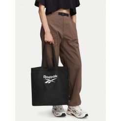 Torebka Reebok. Czarne shopperki damskie Reebok, bez wzorów, bez dodatków. Za 69.99 zł.