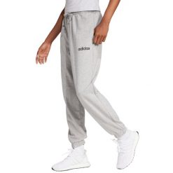 Damskie spodnie dresowe adidas Essentials Linear French Terry Cuffed. Szare spodnie dresowe damskie Adidas, bez wzorów, z bawełny, sportowe. Za 157.99 zł.