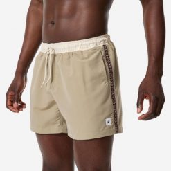 Spodenki surfingowe męskie Decathlon 100 Georetro 15". Brązowe szorty męskie Decathlon, bez wzorów, z materiału, sportowe. Za 49.99 zł.