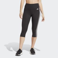 Legginsy treningowe Adidas Train Essentials 3-Stripes High-Waisted 3/4. Czarne legginsy damskie Adidas, bez wzorów, z materiału. Za 179.00 zł.