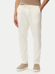 Tommy Hilfiger Chinosy Harlem MW0MW42336 Kremowy Regular Fit. Białe eleganckie spodnie męskie Tommy Hilfiger, bez wzorów, ze lnu. Za 529.99 zł.