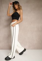 Jasnobeżowe Szerokie Spodnie Dresowe High Waist Zdobione Lampasami Sopaline. Brązowe spodnie dresowe damskie Renee, z aplikacjami, z dresówki, eleganckie. Za 49.99 zł.