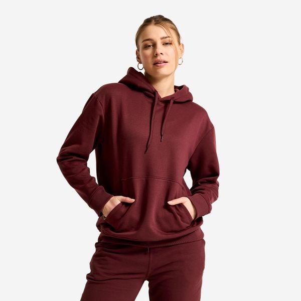 Bluza z kapturem damska Essential. Czarne bluzy damskie Decathlon, l, bez wzorów, z materiału, klasyczne, bez ramiączek, z kapturem. Za 89.99 zł.