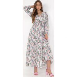 Jasnoniebieska Sukienka Partharpia. Niebieskie sukienki damskie Born2be, l, z aplikacjami, z materiału, bez kołnierzyka, bez ramiączek, maxi, kopertowe. Za 74.99 zł.