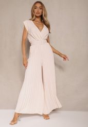 Beżowy Kopertowy Kombinezon Wide Leg Zdobiony Plisami i Paskiem z Klamrą Salirella. Brązowe sukienki damskie Renee, na co dzień, l, z aplikacjami, eleganckie, bez kołnierzyka, bez ramiączek, kopertowe. Za 84.99 zł.