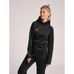 Damska bluza z kapturem Hummel Cima XK. Brązowe bluzy damskie Hummel, s, bez wzorów, sportowe, bez ramiączek, z kapturem. Za 288.60 zł.