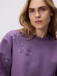 Bluza z ozdobnym haftem - wielobarwny. Bluzy damskie Reserved, l, bez wzorów, z dzianiny, bez ramiączek, bez kaptura. W wyprzedaży za 79.99 zł.