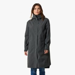 Płaszcz wiatroszczelny kobieca Swedemount Öckerö Shell Coat. Niebieskie płaszcze damskie SWEDEMOUNT, xl, bez wzorów, z materiału, bez kołnierzyka, z kapturem. Za 699.99 zł.