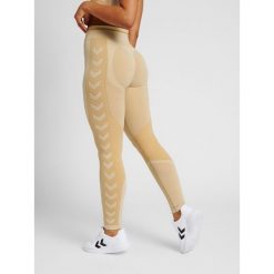 Legginsy damskie Hummel MT Lulu. Brązowe legginsy damskie Hummel, bez wzorów, z dzianiny, na jogę i pilates. W wyprzedaży za 172.00 zł.