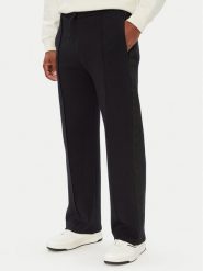 Guess Spodnie dresowe Z6YB14 K4966 Czarny Regular Fit. Czarne spodnie sportowe męskie Guess, m, z aplikacjami, z bawełny. Za 394.99 zł.