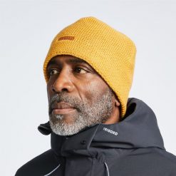 Czapka żeglarska Tribord Sailing 100 ocieplana. Brązowe czapki damskie TRIBORD, bez wzorów, z materiału, sportowe. W wyprzedaży za 29.99 zł.